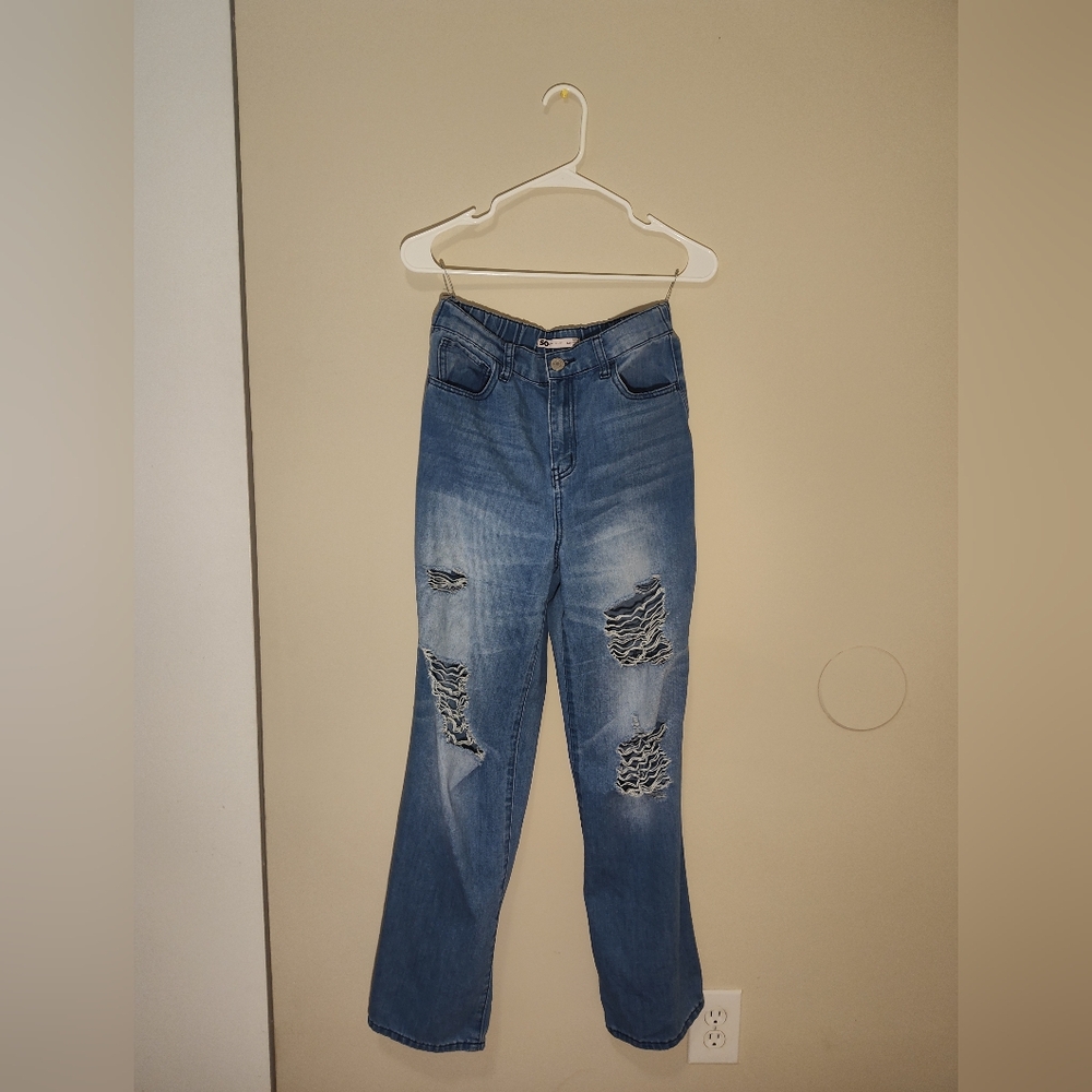 Distressed light wash high rise wide leg jeans